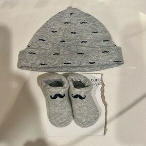 Matching Newborn Carter’s  “mustache” Beanie and Socks! Never used. Sooo cute!